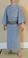 A yukata, which is unlined and made of cotton, is worn mostly in the summer. Putting your arms through the sleeves, gentlemen and ladies alike wear the yukata with the left side wrapped over the right side, and tie the obi sash.